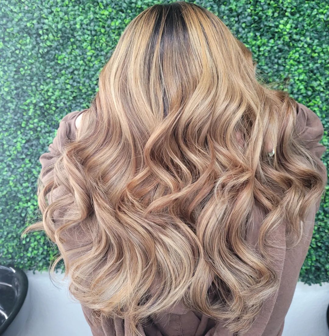 Honey blonde with native dark hair roots
