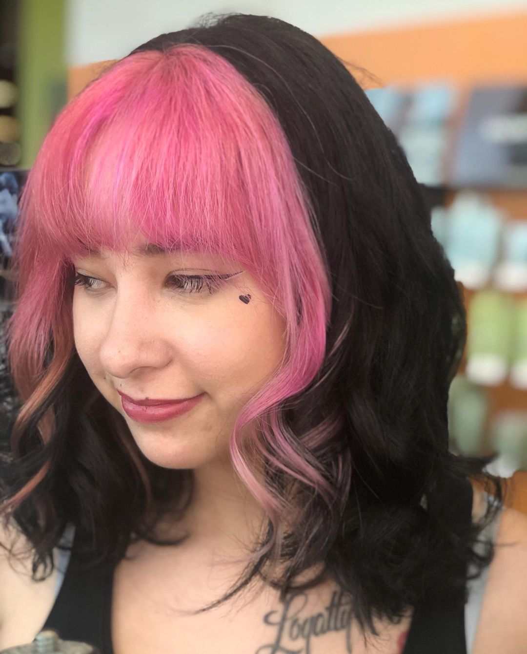 Pink bangs and a black base
